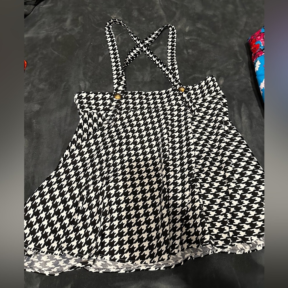Suspender dress with adjustable straps